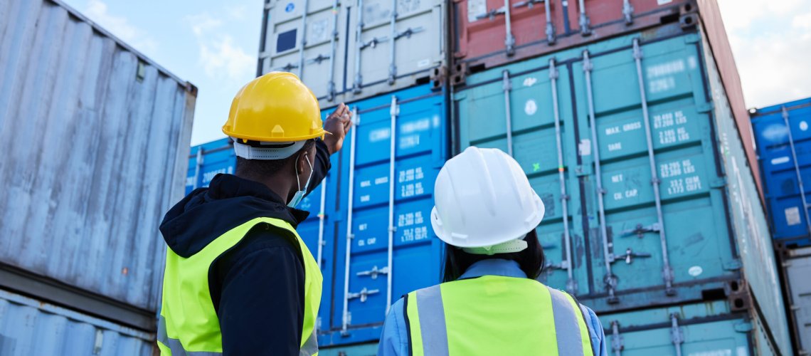 Logistics, shipping and manager planning container export with employee in an export delivery indus.